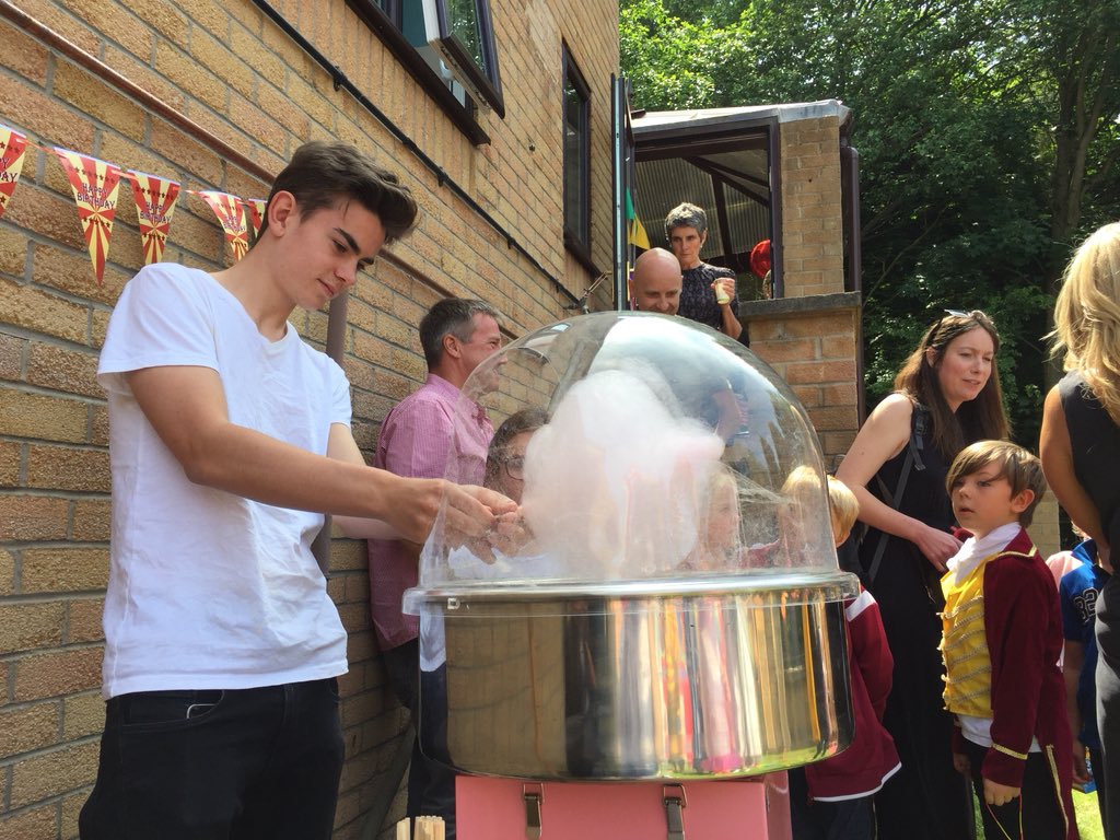 making candy floss at kids animal party 